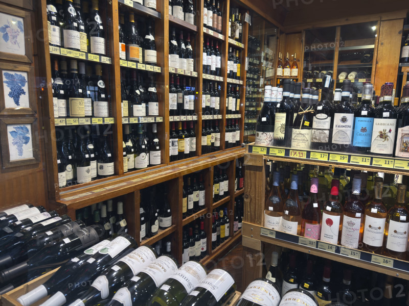 Assortment of bottles of wine in wine shop