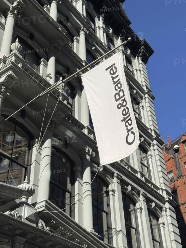 Crate & Barrel store banner hanging from exterior store building, low angle view, New York City, New York, USA