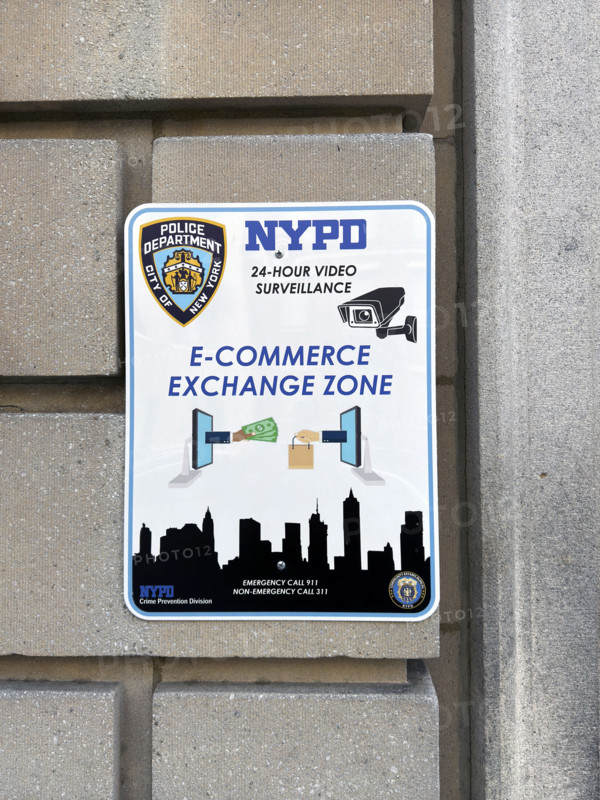 NYPD Station E-Commerce Exchange Zone, close-up of sign on building exterior, 10th Precinct, New York City, New York, USA