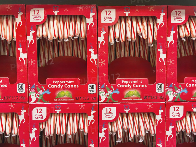 Boxes of peppermint candy canes on display at supermarket