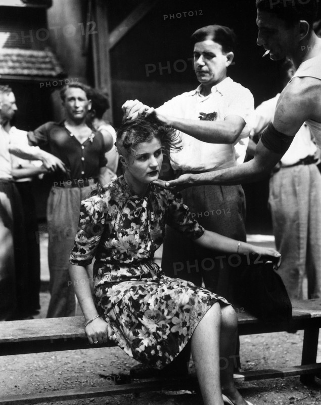 French civilians shaving woman's head as punishment for having personal relations with German soldiers,  Montelimar, France, U.S. Army Signal Corps, August 29, 1944