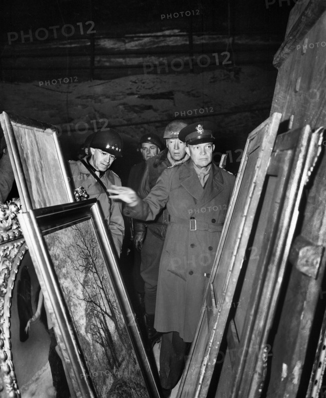 U.S. General Dwight D. Eisenhower, Supreme Allied Commander, accompanied by General Omar N. Bradley, and Lieutenant General George S. Patton, Jr., inspecting art treasures stolen by Germans and hidden in salt mine, Germany, U.S. Army Signal Corps, April 12, 1945
