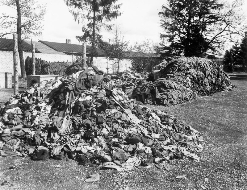 Piles of clothes that belonged to prisoners of Dachau Concentration Camp, Dachau, Bavaria, Germany, U.S. Army Signal Corps, April 30, 1945