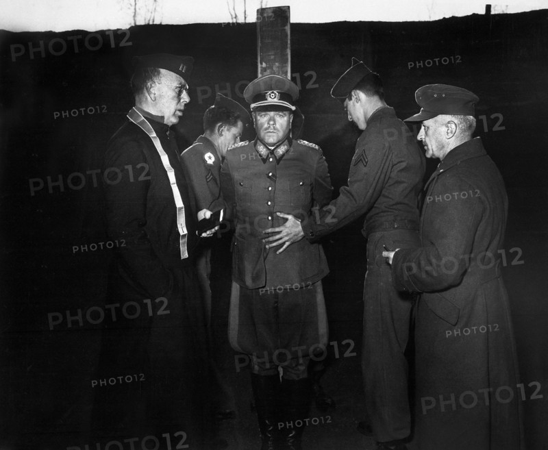 German General Anton Dostler, convicted and sentenced to death by an American military tribunal,  is tied to take before his execution by firing squad Aversa, Italy, U.S. Army Signal Corps, December 1, 1945