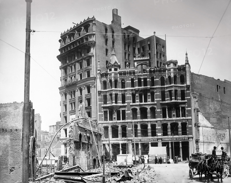 Wells Fargo National Bank Building (left), Postal Telegraph Building (right), vicinity of Montgomery Avenue and Market Street after earthquake, San Francisco, California, USA, U.S. Army Signal Corps, April 1906