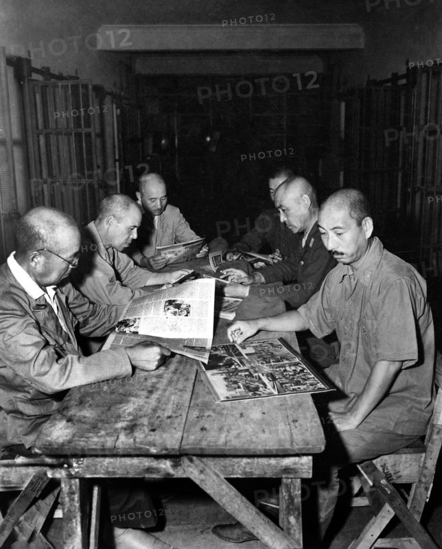 Six high-ranking Japanese generals and admirals, Lt. Gen. Shinpel Fukuei, Maj. Gen. Takeo Manjome, Rear-Adm. Kaku Harada, Maj. Gen. Tadasn Kataoka, Maj. Gen. Isamu Hirai and Maj. Gen. Masuo Yoshiki, who surrendered at Cebu, Philippines, pictured shortly after their incarceration in New Bilibid prison, near Manila, Philippines, U.S. Army Signal Corps, September 3, 1945