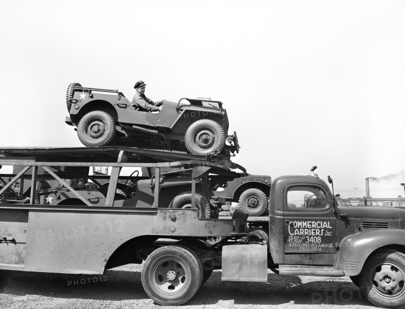 Close-up view of haulaway loaded with U.S. Army vehicles, Detroit, Michigan, USA, Arthur S. Siegel, U.S. Office of War Information, April 1943