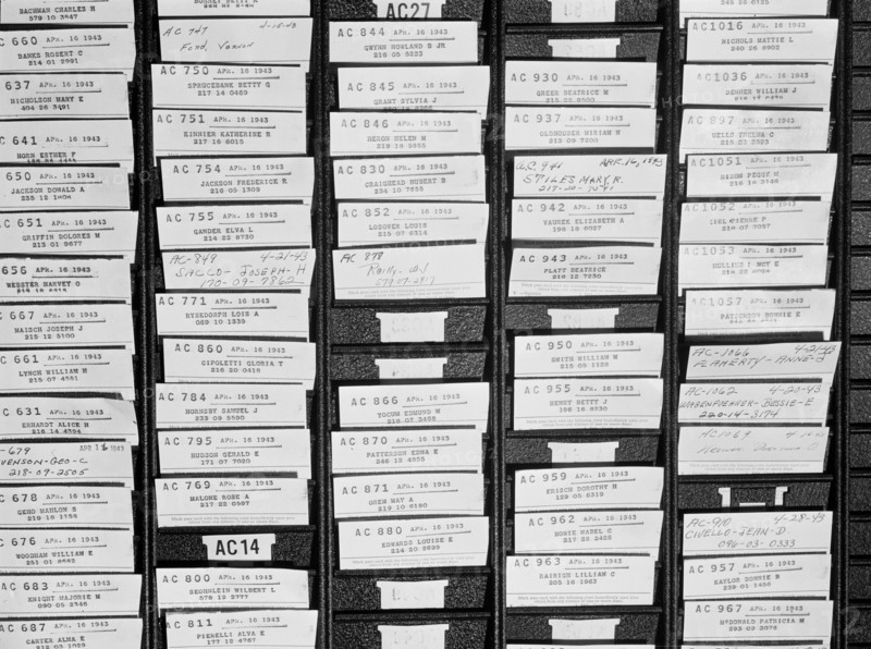 Employee time cards in rack, Bethlehem-Fairfield shipyards, Baltimore, Maryland, USA, Arthur S. Siegel, U.S. Office of War Information, May 1943