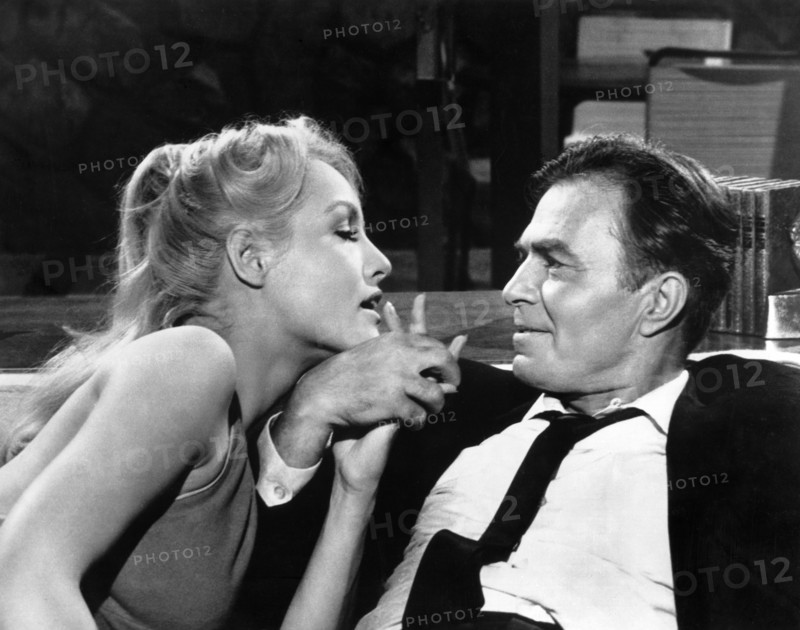 Julie Newmar, James Mason, on-set of the film, "The Marriage-Go-Round", 20th Century-Fox, 1961