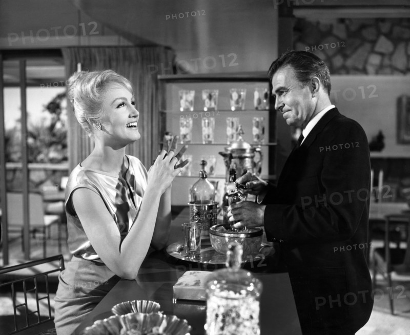 Julie Newmar, James Mason, on-set of the film, "The Marriage-Go-Round", 20th Century-Fox, 1961