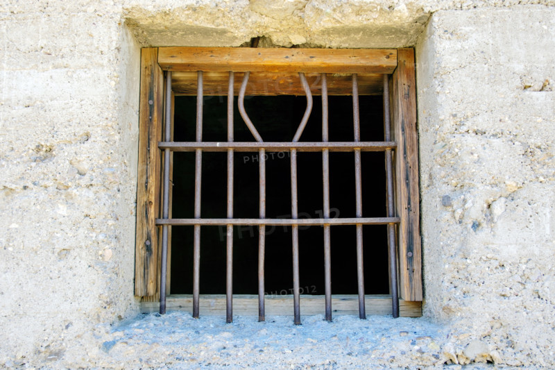 Iron bars on jail window in mining ghost town, Rhyolite, Nevada, USA