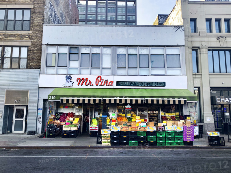 Fruit and vegetable grocery store, building exterior and street scene, Williamsburg, Brooklyn, New York, USA