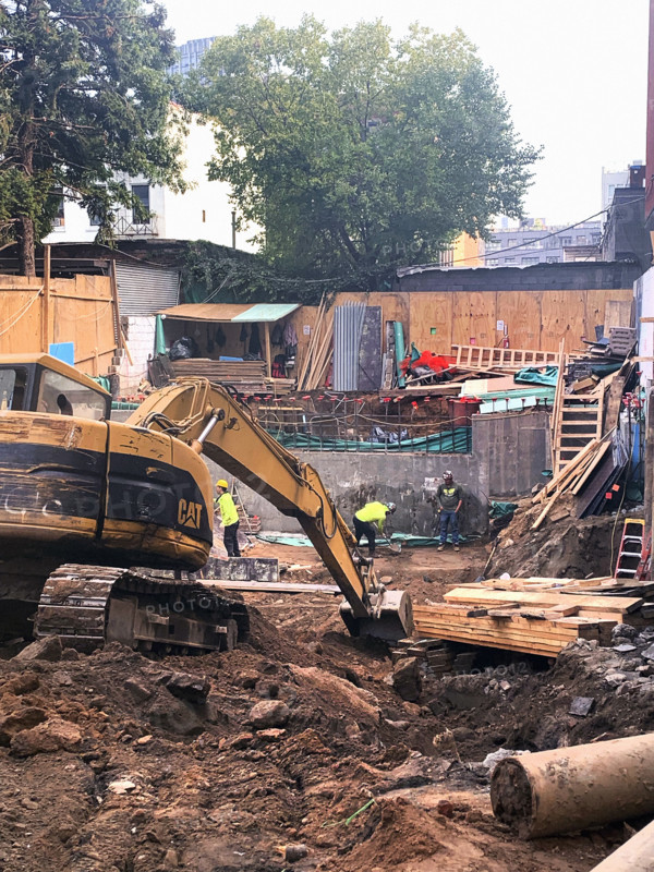Construction site digging foundation, Brooklyn, New York, USA