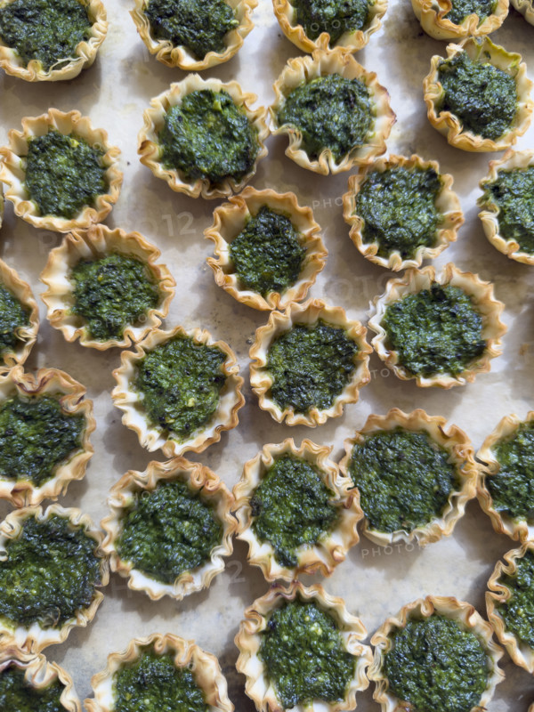 High angle view of mini spanakopita pies
