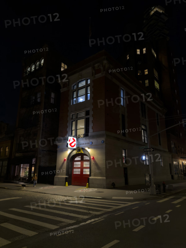 Beaux-Arts style firehouse from 1903 illuminated at night, made famous as the headquarters of the 1984 film,  "Ghostbusters", New York City, New York, USA