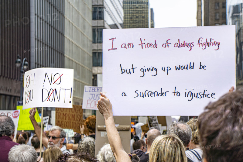 Demonstrators participating in "Our City, Our Fight: Protect Migrants, Protect the Planet" protest, New York City, New York, April 19, 2025