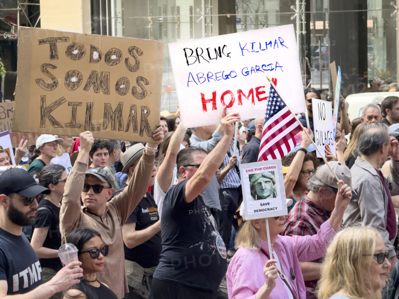 Demonstrators participating in "Our City, Our Fight: Protect Migrants, Protect the Planet" protest, New York City, New York, April 19, 2025