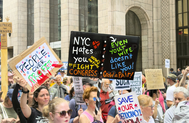 Demonstrators participating in "Our City, Our Fight: Protect Migrants, Protect the Planet" protest, New York City, New York, April 19, 2025