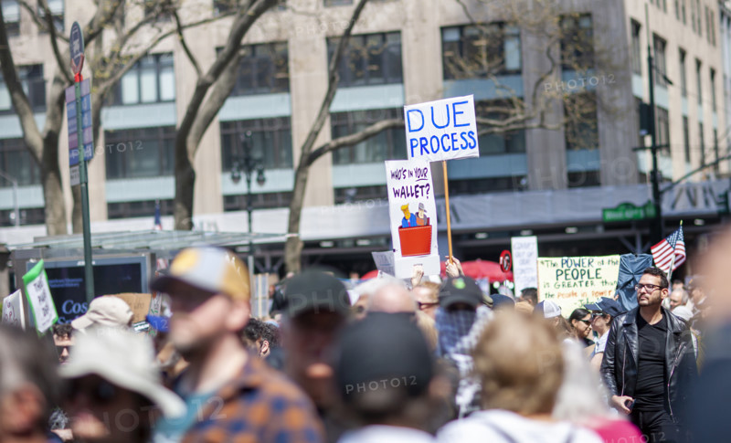 Demonstrators participating in "Our City, Our Fight: Protect Migrants, Protect the Planet" protest, New York City, New York, April 19, 2025