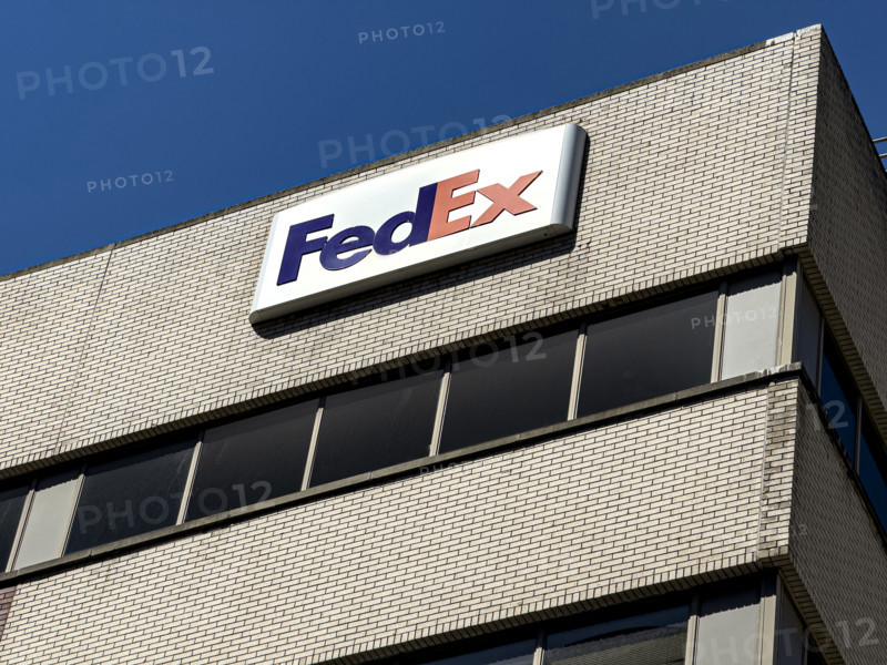 FedEx shipping center, building exterior with logo sign, New York City, New York, USA