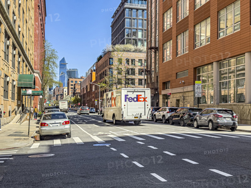 FedEx delivery truck and street scene, New York City, New York, USA