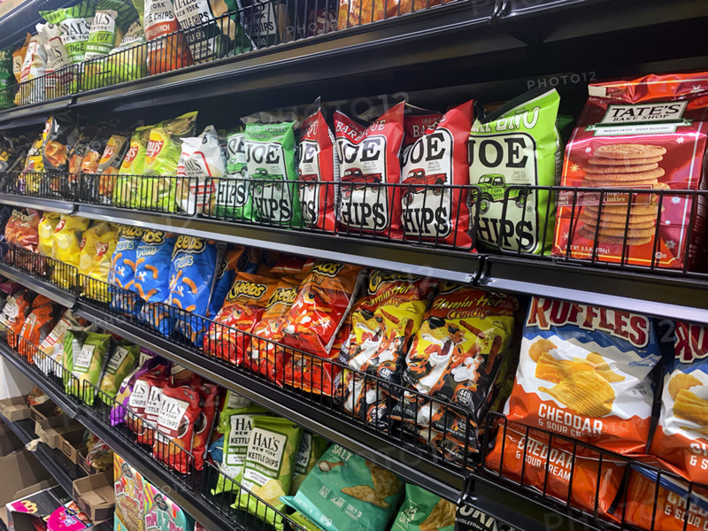 Selection of salty snacks in store