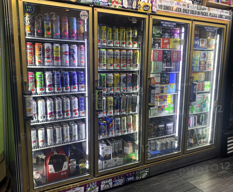 Selection of cold beer in grocery store