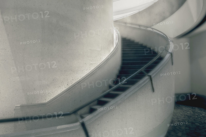 Curved staircase inside commercial building