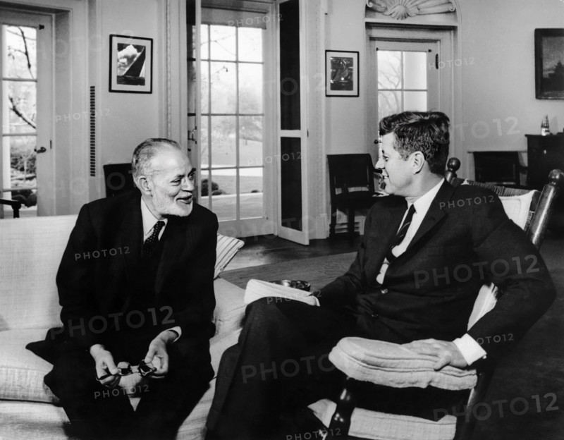 U.S. President John F. Kennedy (in rocking chair) meeting with President of the United Nations (UN) General Assembly, Muhammad Zafrulla Khan, Oval Office, White House, Washington, D.C., USA, Abbie Rowe, White House Photographs, November 21, 1962