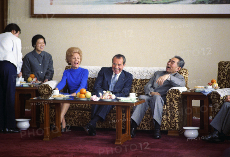 U.S. President Richard M. Nixon and U.S. First Lady Pat Nixon have Tea and Laugh while seated with Chinese Premier Chou En-Lai, Beijing, China, White House Photo Office, February 21, 1972