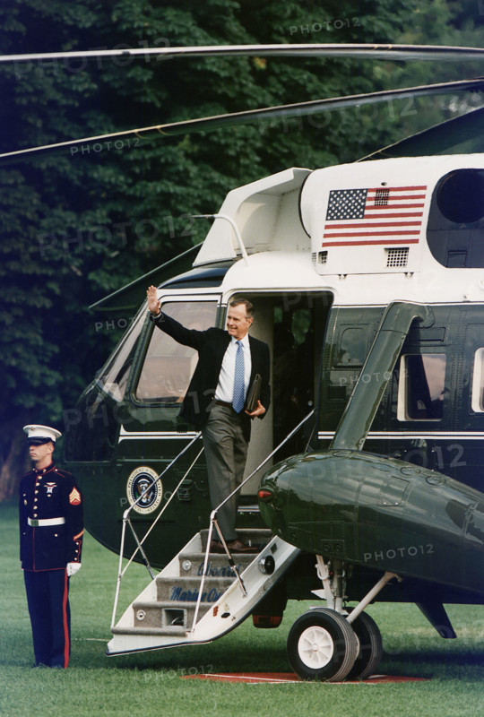 U.S. President George H.W. Bush departing South Lawn of White House aboard Marine One, Washington, D.C., USA, White House Photo Office, July 16, 1990