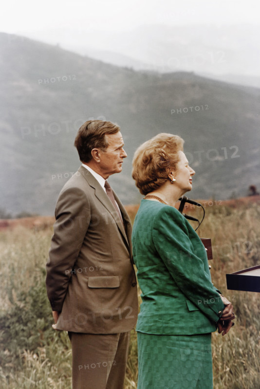 U.S. President George H.W. Bush, accompanied by British Prime Minister Margaret Thatcher, addressing the Aspen Institute Symposium, Aspen, Colorado, USA, White House Photo Office, August 2, 1990