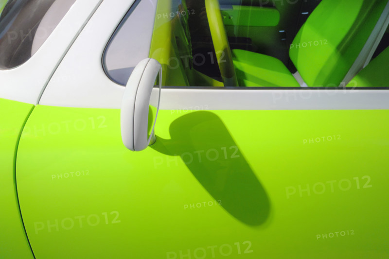 Side mirror detail on bright green 1999 Ford 021C Concept Car