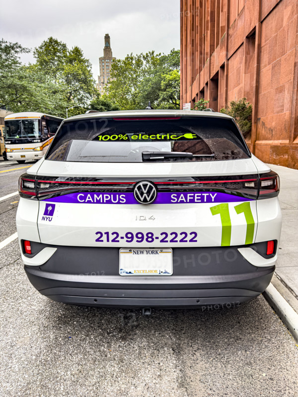 New York University electric car and street scene, New York City