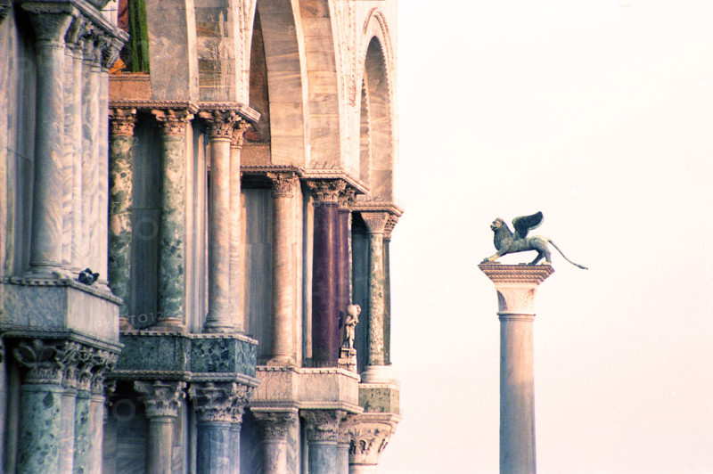 Column of San Marco is depicted with its winged lion, St. Mark's Square, Venice, Italy