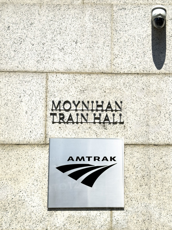 Moynihan Train Hall, James A. Farley Building, building exterior detail of Amtrak sign, Eight Avenue, Manhattan, New York City, New York, USA