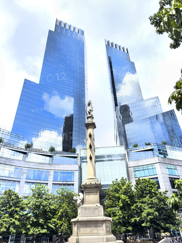 Deutsche Bank Center, building exterior to the left, Mandarin Oriental Hotel, building exterior to the right, Christopher Columbus statue in foreground, Columbus Circle, Manhattan, New York City, New York, USA