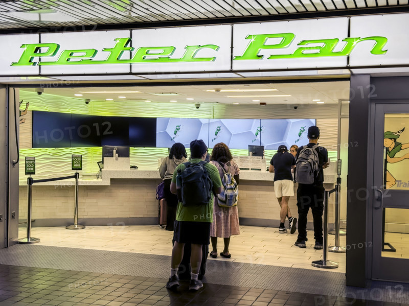 Travelers waiting at ticket window, Peter Pan Bus Lines, Port Authority Bus Terminal, 625 Eighth Avenue, Manhattan, New York City, New York, USA