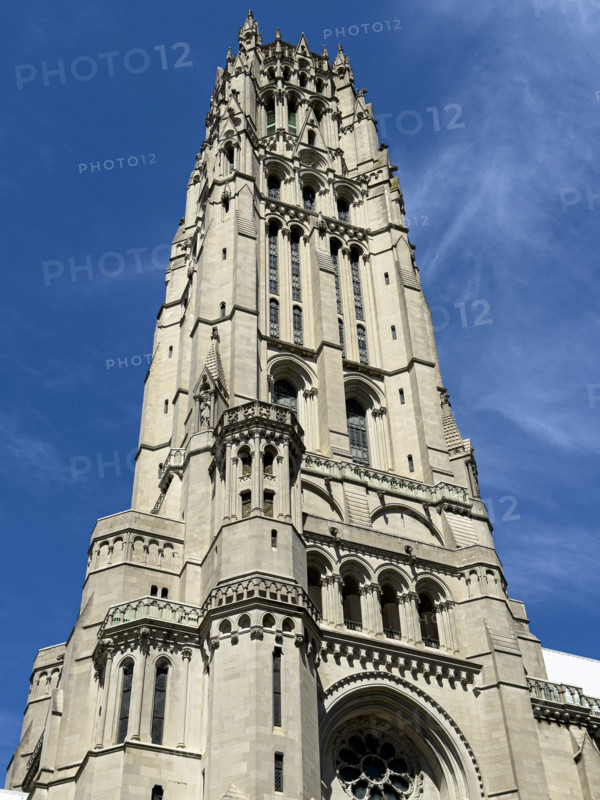 Riverside Church, exterior detail of tower against blue sky, Morningside Heights, Manhattan, New York City, New York, USA