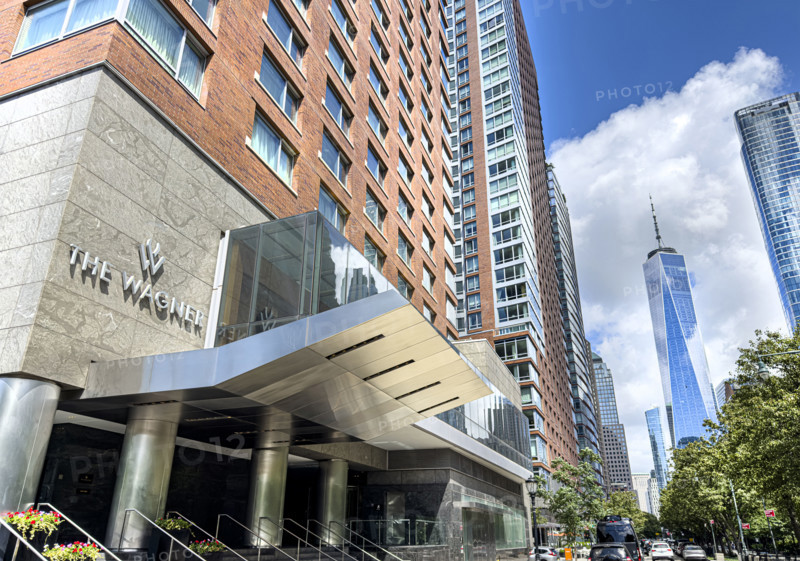 The Wagner Hotel, building exterior with view of One World Trade Center in background, 2 West Street, Tribeca, Manhattan, New York City, New York, USA