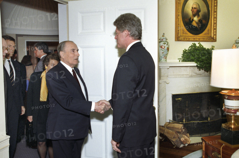 U.S. President Bill Clinton greeting French President François Mitterrand of France as he arrives at the West Wing entrance of the White House, Washington, D.C., USA, Bob McNeely, White House Photographer, March 9, 1993
