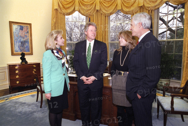 U.S. President Bill Clinton and U.S. First Lady Hillary Clinton meeting with American Actress Jane Fonda and American media entrepreneur Ted Turner in the Oval Office of the White House, Washington, D.C., USA, Barbara Kinney, White House Photographer, March 17, 1993