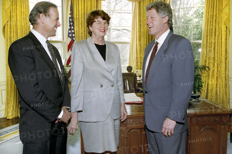 U.S. Senator Joseph Biden and newly-appointed U.S. Attorney General Janet Reno with U.S. President Bill Clinton in the Oval Office, White House, Washington, D.C., USA, Bob McNeely, White House Photographer, March 11, 1993