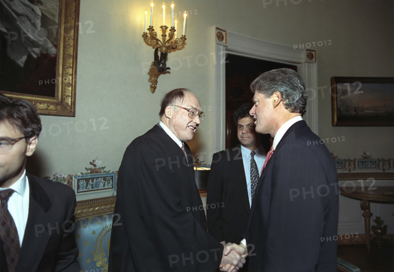 U.S. President Bill Clinton shaking hands with Chief Justice of the U.S. William Rehnquist in the East Room of the White House, Washington, D.C., USA, Bob McNeely, White House Photographer, January 22, 1993