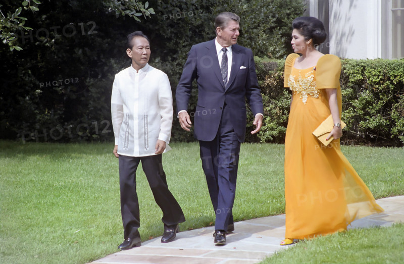 U.S. President Ronald Reagan with President of The Philippines Ferdinand Marcos and Imelda Marcos during a state visit outside the Oval Office of the White House, Washington, D.C., USA, President Ronald Reagan White House Photographic Office, September 16, 1982