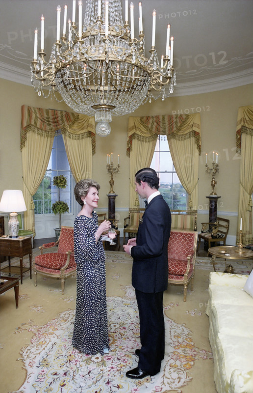U.S. First Lady Nancy Reagan with Prince Charles in the Yellow Oval Room during private dinner for The Prince of Wales, White House, Washington, D.C., USA, President Ronald Reagan White House Photographic Office, May 2, 1981