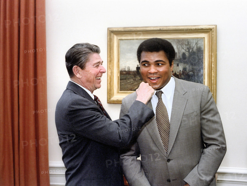 U.S. President Ronald Reagan "punching" American boxer Muhammad Ali in the Oval Office of the White House, Washington, D.C., USA, President Ronald Reagan White House Photographic Office, January 24, 1983