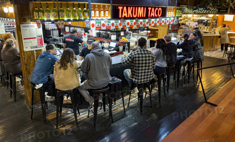 Group of people eating at casual restaurant, Takumi Taco, Chelsea Market, Ninth Avenue, Chelsea, Manhattan, New York City, New York, USA