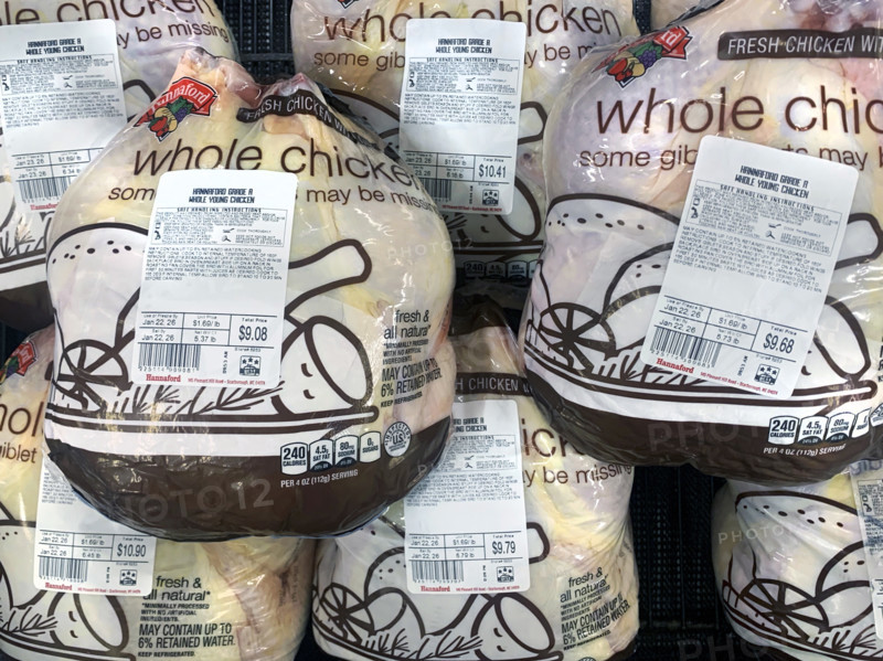 Packaged whole chicken display at grocery store