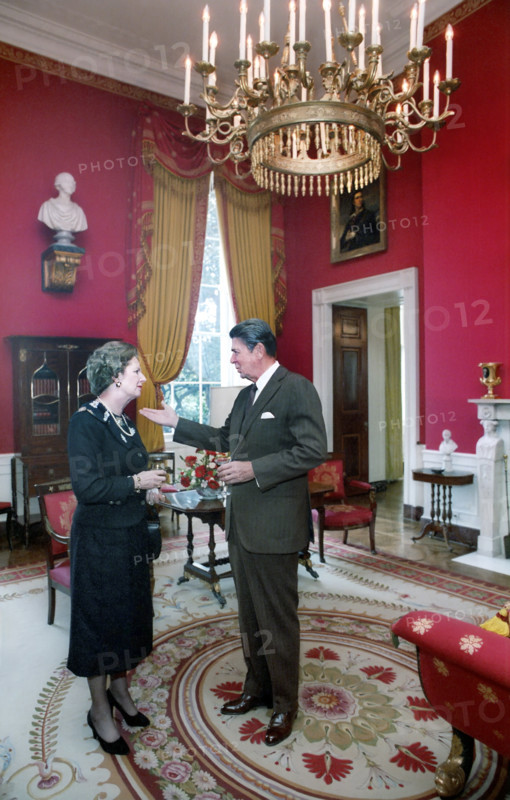 U.S. President Ronald Reagan talking with British Prime Minister Margaret Thatcher in The Red Room of the White House, Washington, D.C.., USA, President Ronald Reagan White House Photographic Office, September 29, 1983